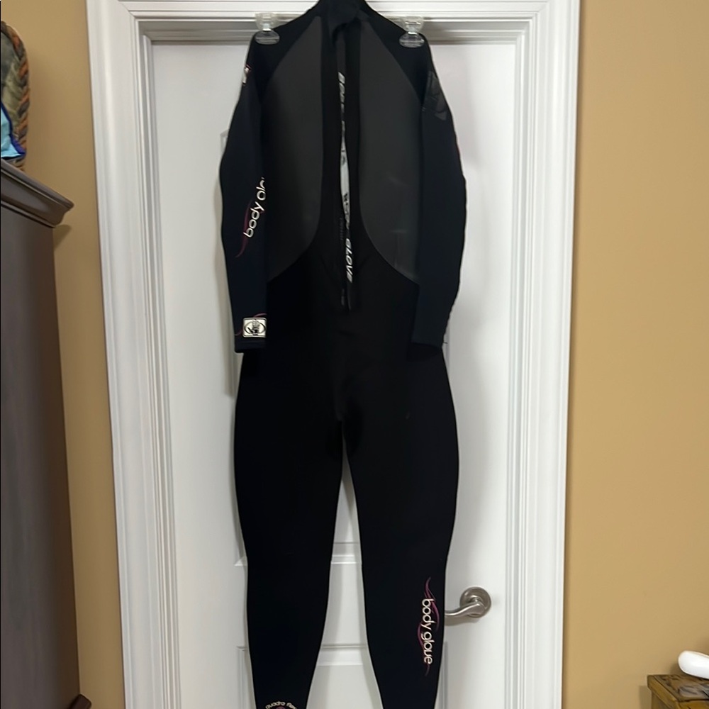 Body Glove Black Wetsuit with Pink Details. Size 9/10.  Excellent condition